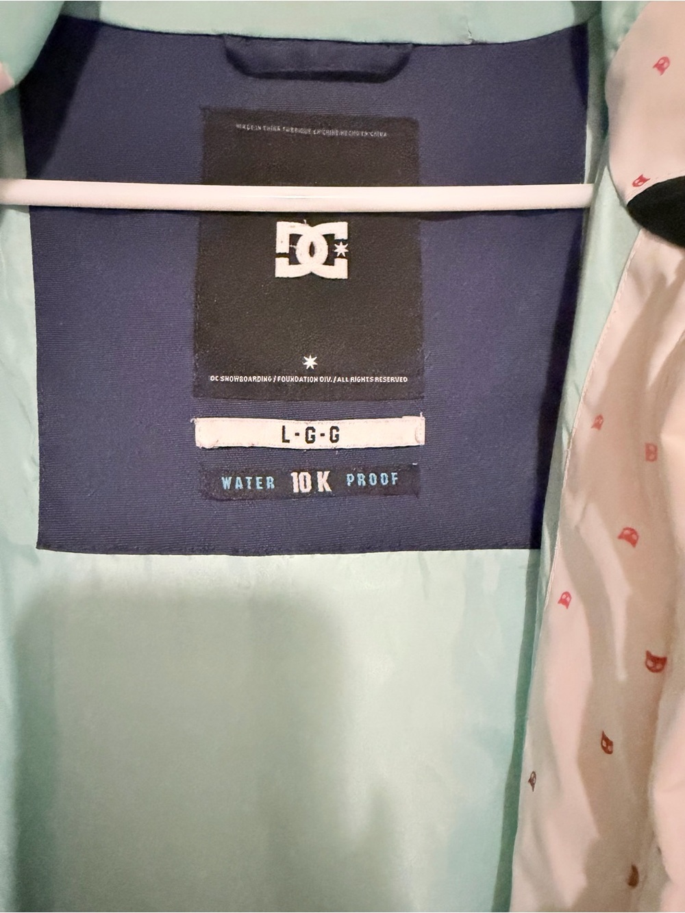 DC Women’s White Jacket with Navy Sleeves - Picture 13 of 14